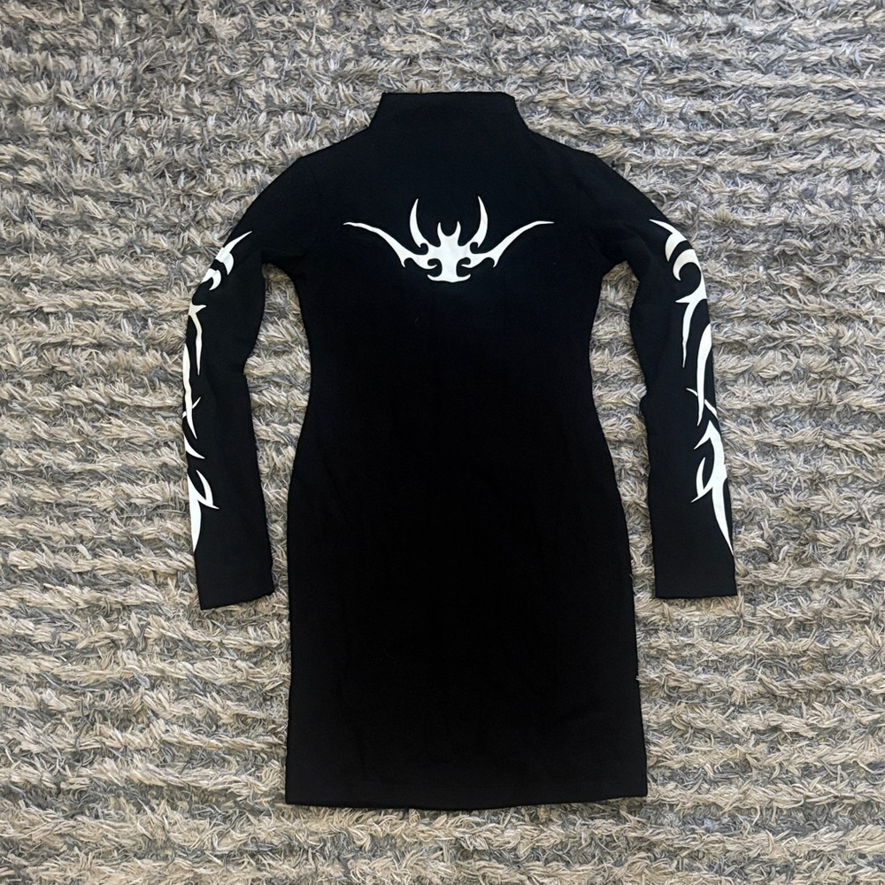 Elegant Black Dress with White Tribal Accents